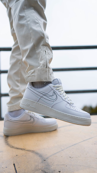 Nike triple white with sale printed swoosh air force